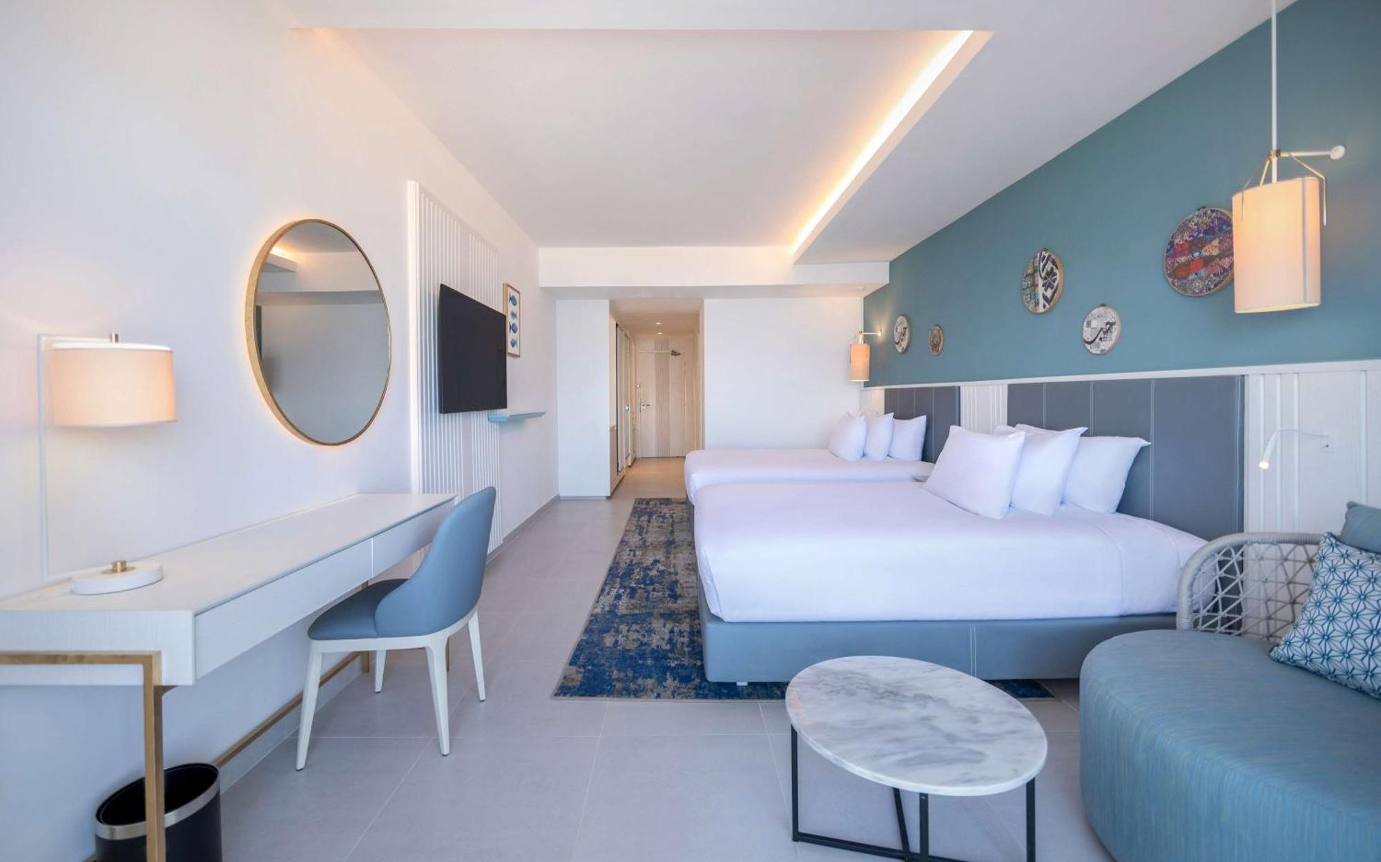 Deluxe Zimmer mit 2 Queensize-Betten – direkter Meerblick