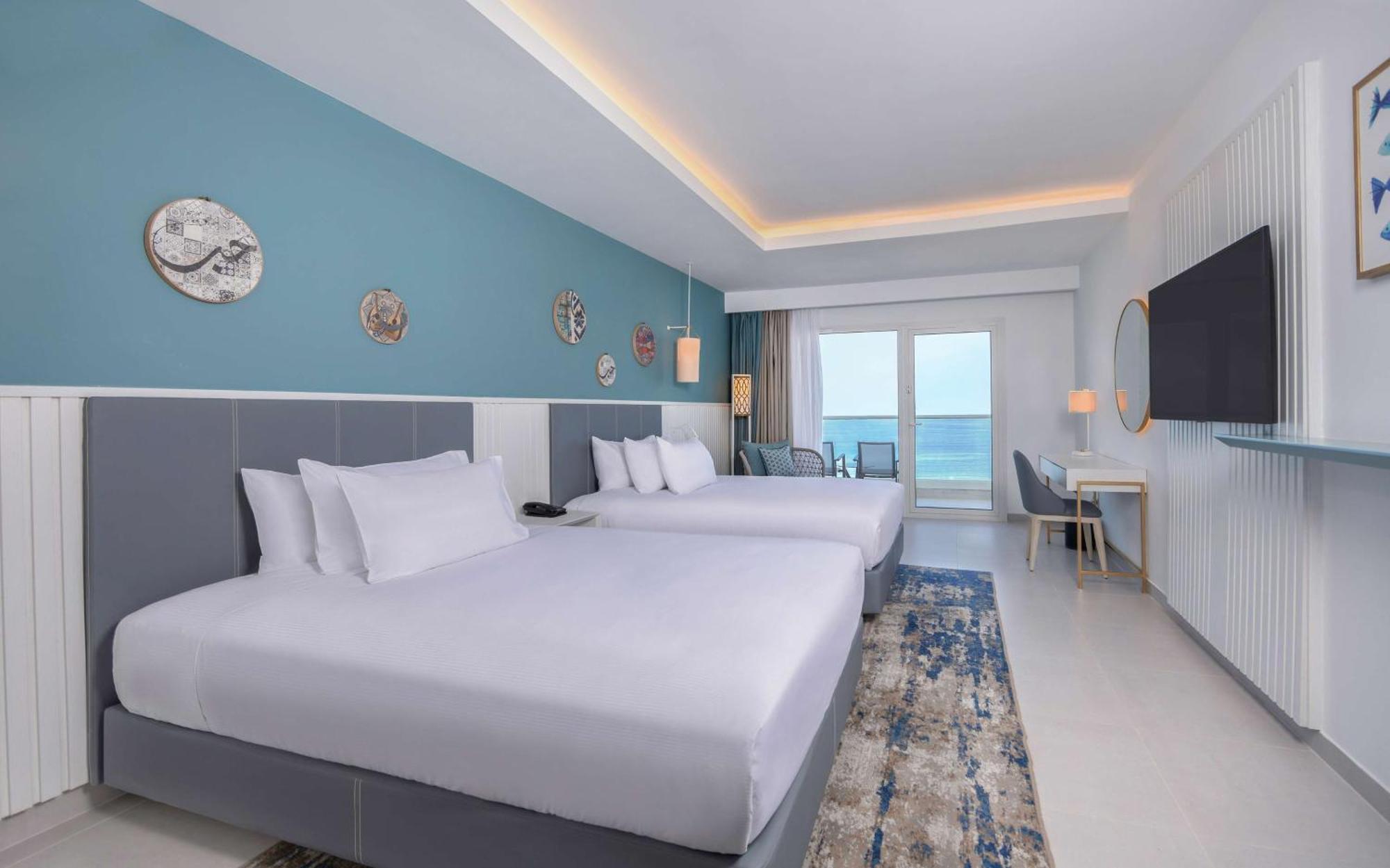 Suite mit 1 Schlafzimmer mit 2 Queensize-Betten – direkter Meerblick